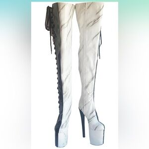 Brand new Women’s zip up thigh high 7.9” boots
